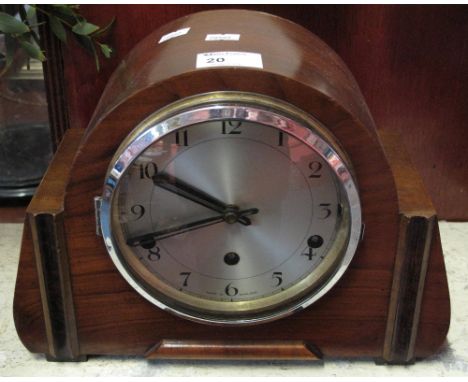 Mid 20th Century English walnut cased arch topped mantel clock with three train movement. 