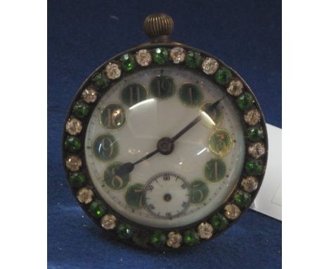 A jewelled keyless bullseye pocket watch style mantel clock. 