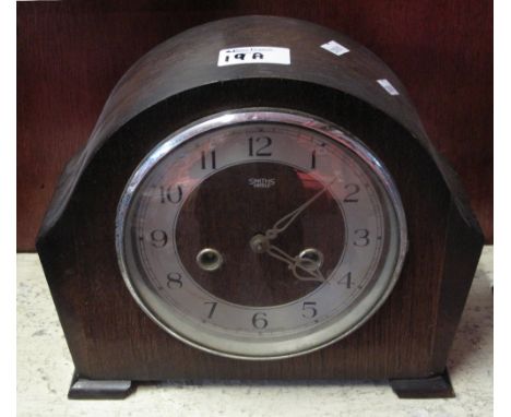 Smiths oak arch top mantel clock, two train movement.