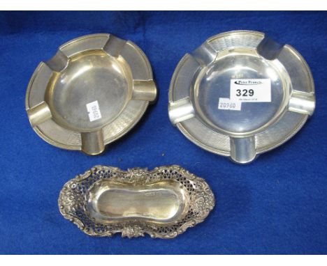 Pair of engine turned, silver Walker and Hall ashtrays, together with a small pierced silver dish. (3)