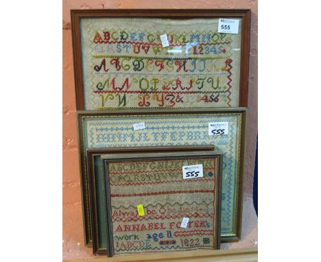 Group of four assorted small framed tapestry samplers. (4)