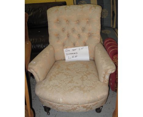 Victorian foliate upholstered, button back easy chair.