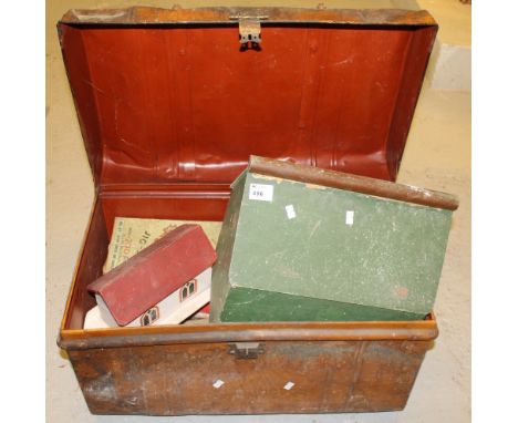 Tin trunk containing various items including: Buccaneer boxed game; jigsaw puzzle; wooden models of buildings etc.