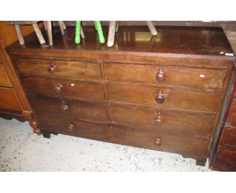 19th Century mahogany straight front chest of six short drawers and one long drawer on bracket feet.