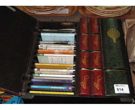 CD wall shelf in the form of an antique library book containing various CDs: Russell Watson; Greatest Crooners etc.