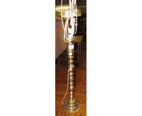 Modern brass baluster table lamp with shade.