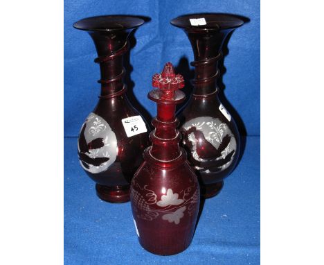 Pair of ruby flash decorated baluster shaped vases with flared necks together with similar ruby flash trailing vine decorated