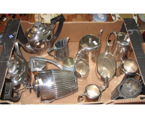 Tray of assorted silver plated items to include: fluted tea service; jugs; water pot; sucrier etc.