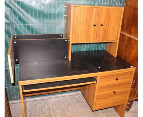 1970s oak finish desk with fitted cupboards and shelves.