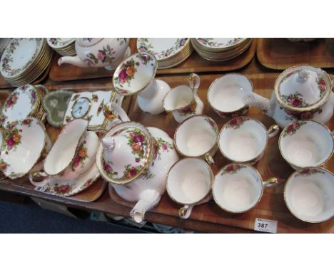 Two trays of Royal Albert old country roses bone china teaware and other items to include teacups, saucers, bowls, plates, te