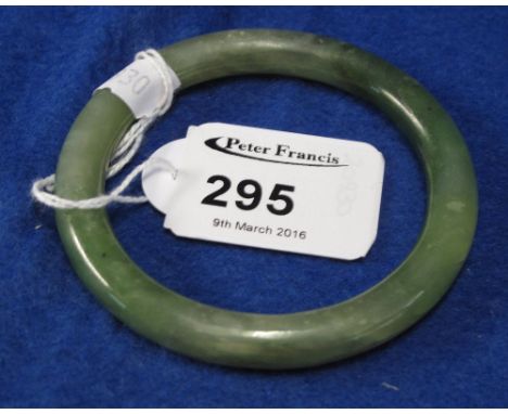 Oriental jade bangle.