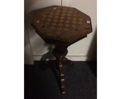 Victorian walnut inlaid work box with chessboard top, fitted interior raised on tripod base, 79cm tall