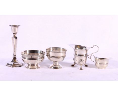 Two silver sugar bowls, a silver cream jug, a silver sauceboat and a silver candlestick (5). 402g gross.