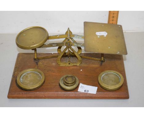 A vintage brass postal scale