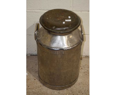 A vintage Nestle metal milk churn