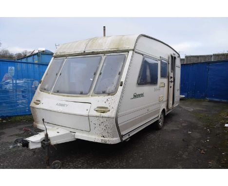 A County Somerset caravan with woodburner fitted internally - some cosmetic repairs required