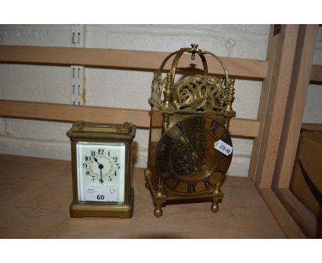 Reproduction brass lantern clock with French movement together with a small carriage clock with white enamel and floral decor