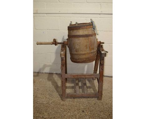 A vintage Lister &amp; Co milk churn on wooden base