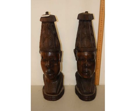 A pair of hardwood figural table lamp bases