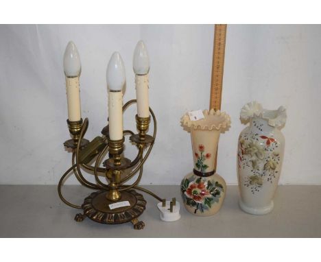 A brass three branch table lamp together with a further pair of milk glass vases