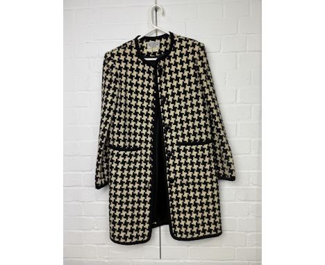 CAROLINE CHARLES: A VINTAGE LADIES BLACK AND WHITE HOUNDSTOOTH JACKETSize USA 6.94cm LProvenance: Property of Kathryn Samuel,
