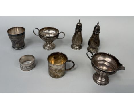 A GROUP OF SILVER ITEMS TO INCLUDE SUGAR SHAKERS, CHRISTENING CUPS, NAPKIN RING, PEDESTAL CUPS, SPOON
