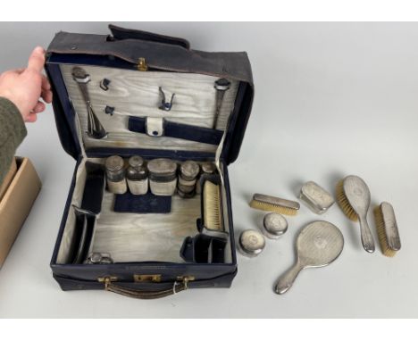 A COLLECTION OF SILVER VANITY ITEMS TO INCLUDE A PART CASED SET HOUSED IN BLUE LEATHER CASE BY J.C. VICKERY, REGENT STREET