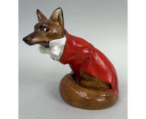A ROYAL DOULTON CERAMIC FOX IN HUNTING ATTIRE16cm H