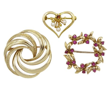 Gold ruby leaf design wreath brooch, gold pearl and pink stone heart brooch and a gold swirl brooch, all hallmarked 9ctCondit