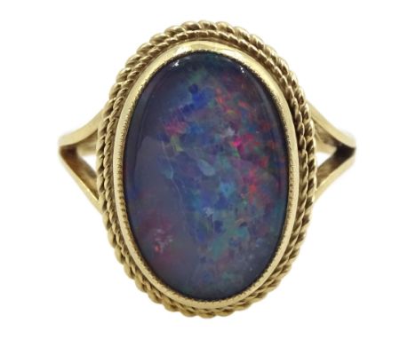 9ct gold oval opal triplet ring, hallmarked Condition Report:Approx 3.4gm, size L-M, milky area to one side of the opal 