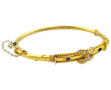 Early 20th century 15ct gold sapphire and split pearl hinged bangle, stamped 15ctCondition Report:Approx 7.4gm, split/loss to