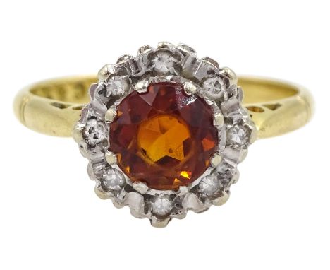 18ct gold orange garnet and diamond chip ring, Birmingham 1968Condition Report:Approx 2.95gm, size L, head diameter = 10mm, l