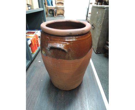 A terracotta egg crock/planter