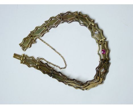 AUSTRIAN 14CT GOLD DOUBLE TIER FLAT LINK BRACELET, 13 links, the central three set with Ruby and two diamonds, 19cms approxim