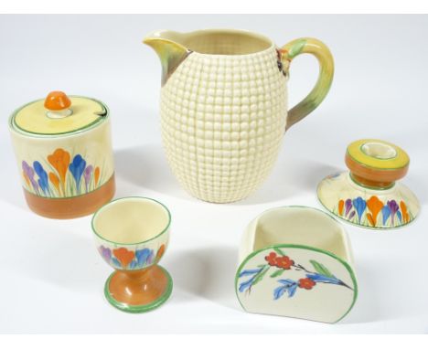 CLARICE CLIFF BIZARRE for Newport and Wilkinson's pottery, 5 pieces to include a squat candlestick, egg cup and preserve jar 