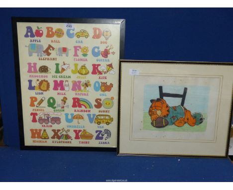 A framed Print depicting letters of the Alphabet, along with a framed painting of Garfield asleep under the rugby posts.