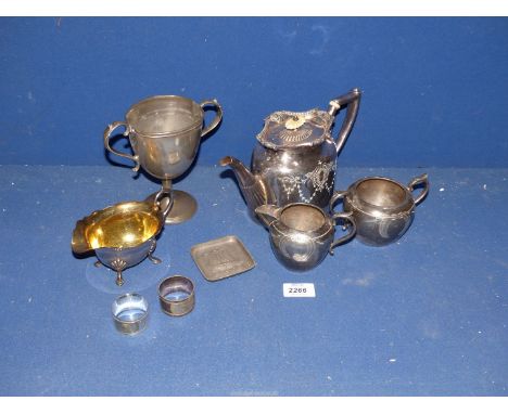 A pewter ashtray and cup and a quantity of silver plated items including a presentation teapot, sugar bowl and milk jug, two 