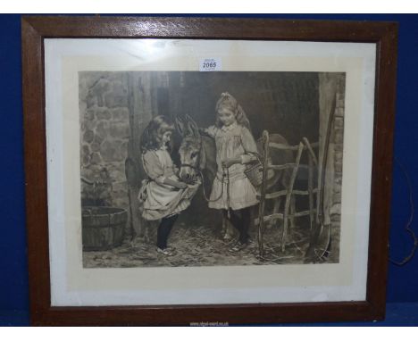 A wooden framed Print stamped with Artist London proof logo, depicting two young girls feeding a donkey. 25" x 21".