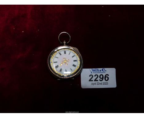 A ladies 925 stamped Silver Pocket Watch with white enamel dial, Roman numerals, no. 388346, gilt floral pattern decoration t