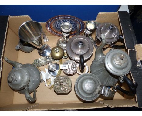 A quantity of metalware to include coffee pot, teapot and lidded stein, brass leaf design call bell, brass feather letter ope