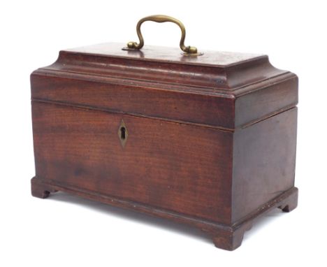 Georgian mahogany sarcophagus tea caddy, the cover with brass swing handle enclosing divided interior upon bracket feet, 10" 