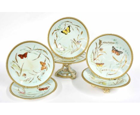 Attractive 19th century Worcester Butterflies pattern part dessert service, finely enamelled and gilded upon a pale green gro