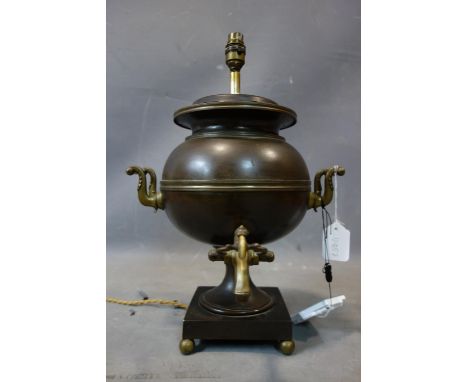 A copper and brass samovar converted to a table lamp, on square base with ball feet, H.47cm, one foot broken 