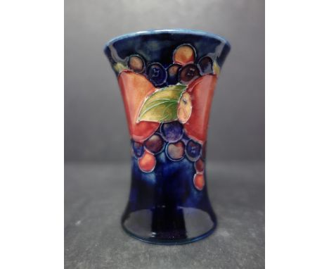 A vintage Moorcroft Pomegranate miniature cylindrical vase, stamped potter to H.M the Queen, H.9cm 