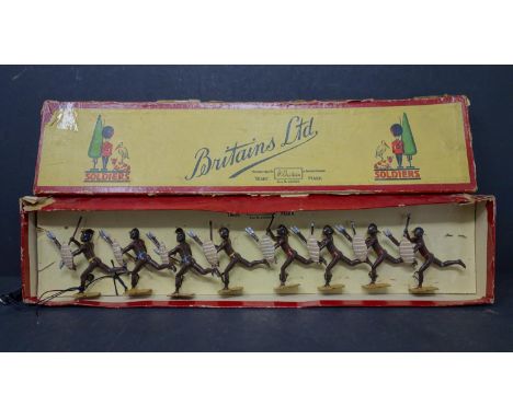 A boxed set of vintage lead figures of Zulu warriors by William Britain 