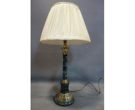 A green marble and brass table lamp, with silk shade, H.86cm 