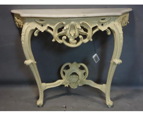 A Rococo style marble topped console table, H.83 W.102 D.34cm 