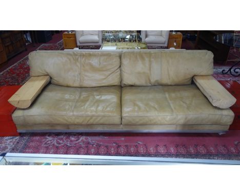 A large Timothy Oulton leather sofa on steel supports, H.81 W.249 D.103cm 