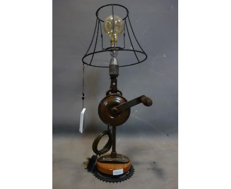 A bespoke table lamp made from an old hand drill, H.64cm 