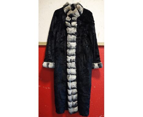 A vintage ladies full length black fur coat, size approx. medium 